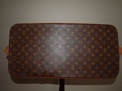 You are bidding on a Louis Vuitton Alma voyage GM travel 