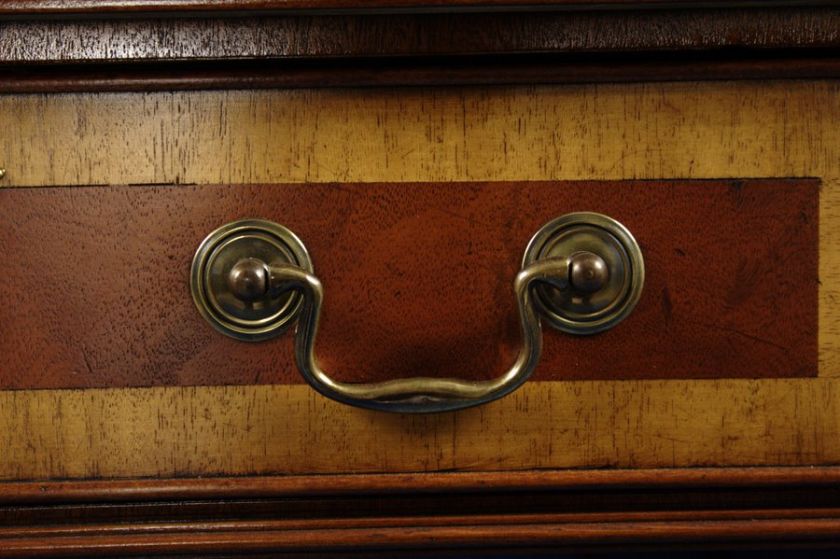 Antiqued solid brass pulls look wonderful against the mahogany and 