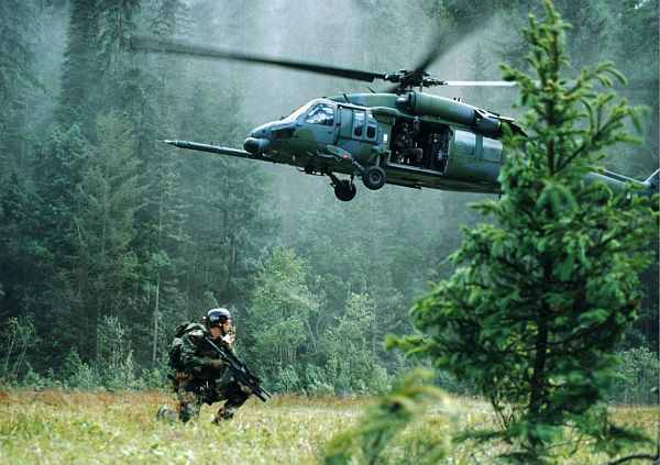 HH 60G Pave Hawk and Pararescue 3 poster  