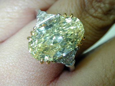 NATURAL DIAMOND 8.00 CT OVAL CUT FANCY YELLOW GIA  